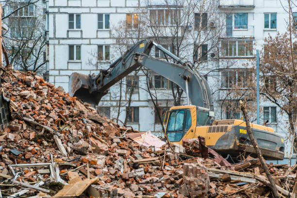 istock excavator working on the wreckage of the building, 1081119458