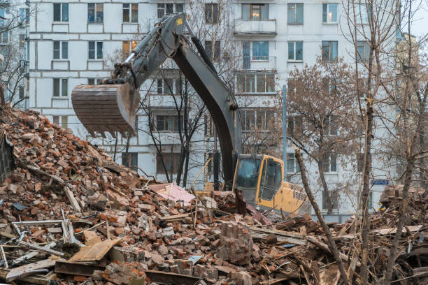 istock excavator working on the wreckage of the building, 1081119462