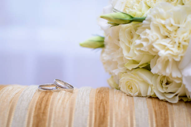 istock Engagement rings and wedding bouquet 1081122324