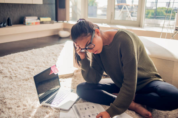 istock young woman working from home 1081122660