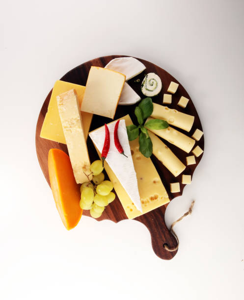 istock Cheese plate served with grapes, various cheese on a platter 1081128628