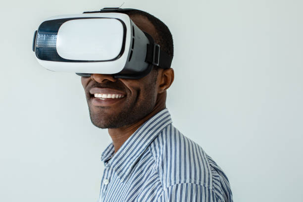 istock Portrait of joyful Afro American man testing VR glasses 1081129140