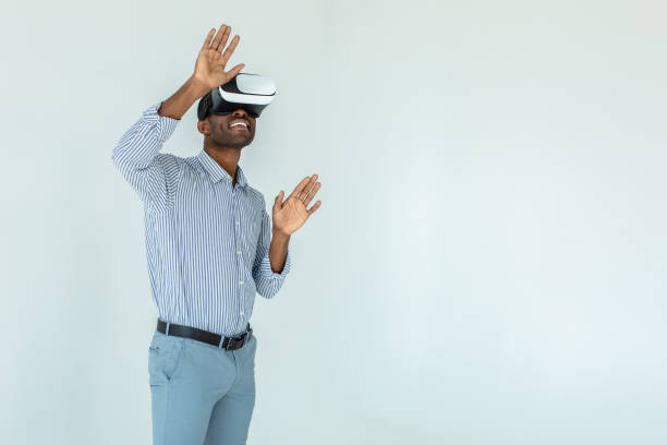 istock African American young man wearing VR goggles 1081129744