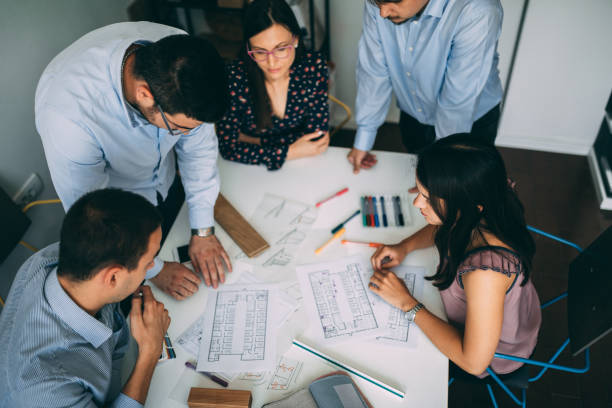 istock Team of young architects working in the office 1081132048