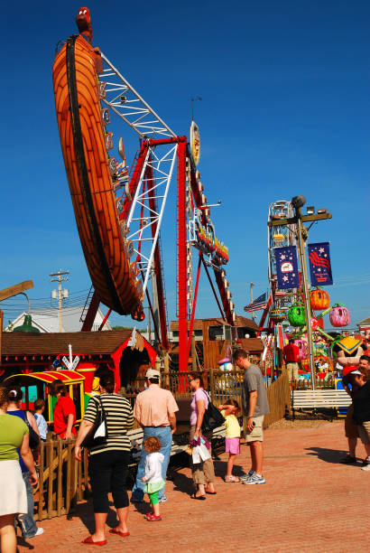 Antique, vintage and historic carnival rides, fair rides, amusement park attractions, horse carousel and antique cars