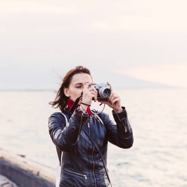 istock Young Woman Taking a Picture 1081146590