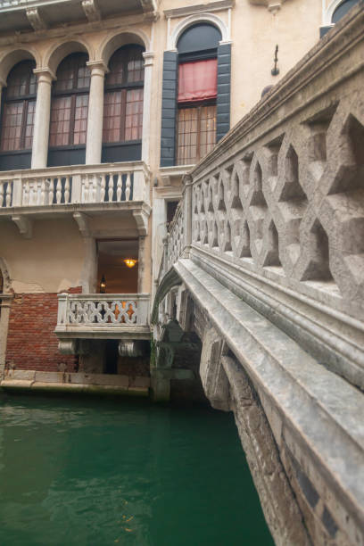istock Bridge heading to builing from bridge side perspective in Venice 1081149650