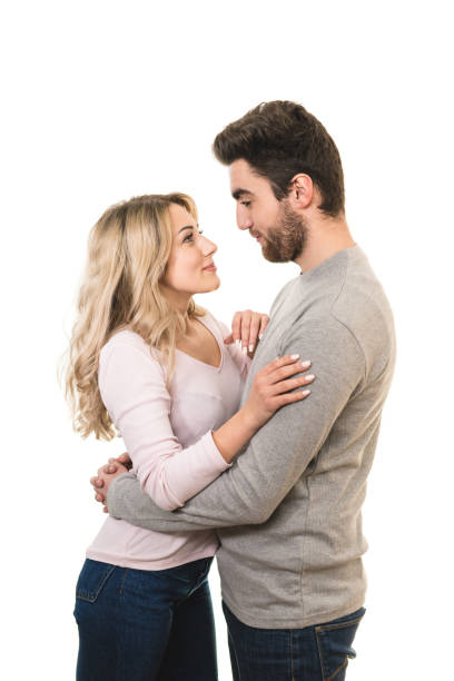 istock The cute couple hug on the white background 1081172380