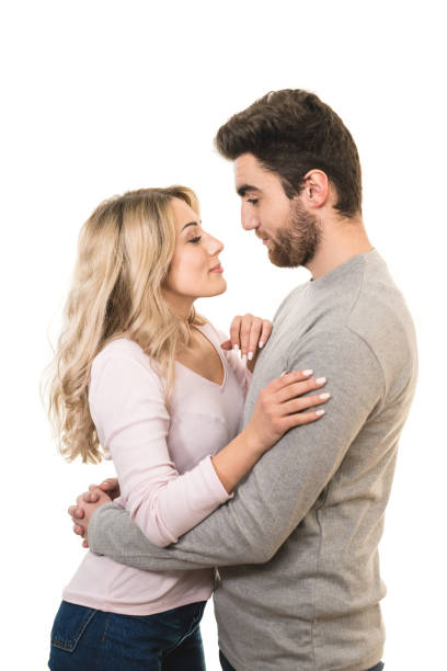 istock The cute couple hug on the white background 1081172386