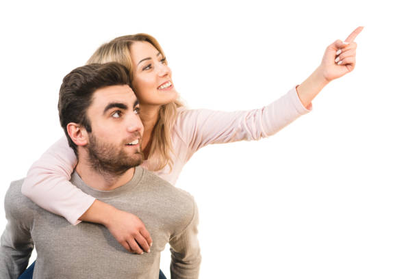 istock The happy couple gesturing on the white background 1081173396
