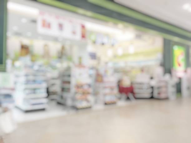 Pharmacy store or drugstore blur background with drug shelf and blurry pharmaceutical products, cosmetic and medication supplies on shelves inside retail shop interior Pharmacy store or drugstore blur background with drug shelf and blurry pharmaceutical products, cosmetic and medication supplies on shelves inside retail shop interior healthcare and medicine business hospital variation stock pictures, royalty-free photos & images