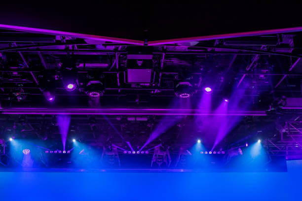 istock abstract background of light and smoke performance on stage 1081176854