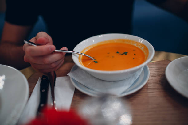 istock Pumpkin cream soup on a table in a restaurant 1081178624