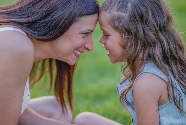 istock Mom and daughter affection 1081179440