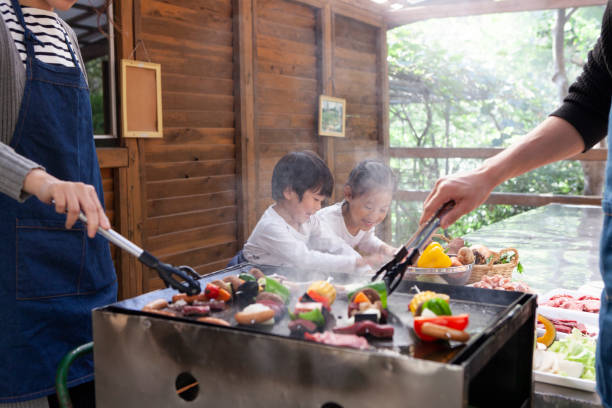 istock Father is grilling the ingredients deliciously 1081211264