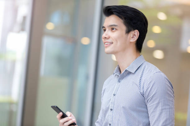 istock Young businessman uses mobile navigation in the city 1081224992