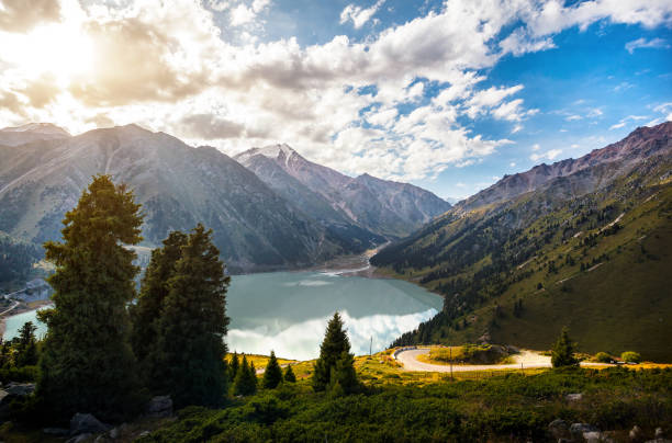 Mountain lake in Kazakhstan Mountain highland lake and forest at sunrise in Almaty, Kazakhstan almaty photos stock pictures, royalty-free photos & images