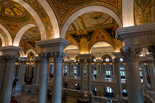 Great Hall. View of the ceiling and cove. Showcasing the aluminum plating, stained glass windows, and murals. Library of Congress Thomas Jefferson Building, Washington, D.C.