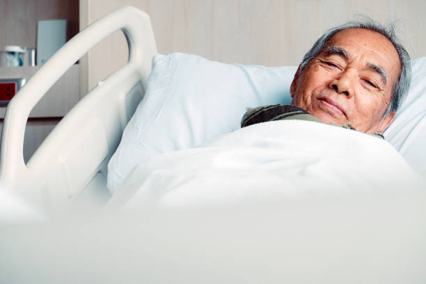 istock Elderly patients in hospital bed 1081233716
