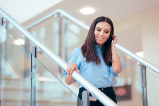 istock Professional Business Woman Walking Down Stairs 1081247154