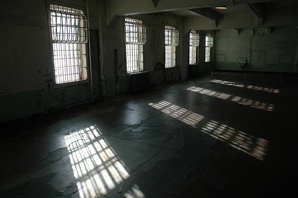 Light Through Prison Bars stock photo