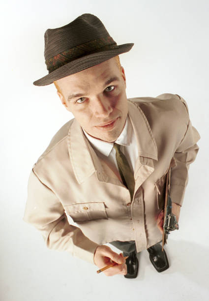 istock Man Wearing Trench Coat and Holding Clipboard 108125170