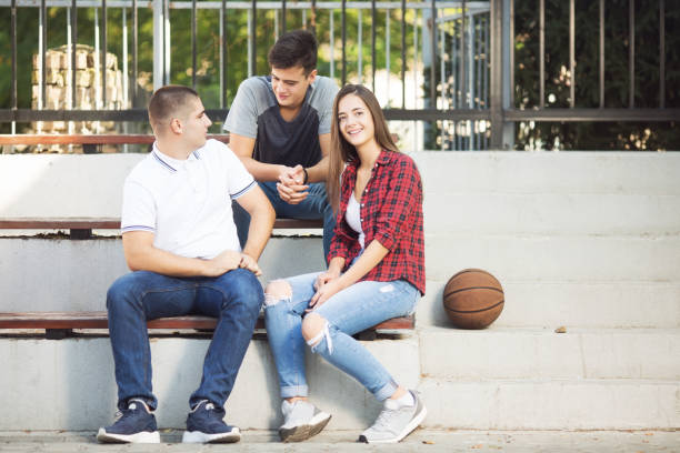 istock Three teenagers laughing and having fun 1081253182