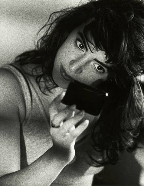 istock Woman looking into a mirror, black and white 108125342