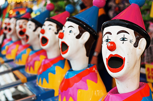 Colorful clowns at the fair.