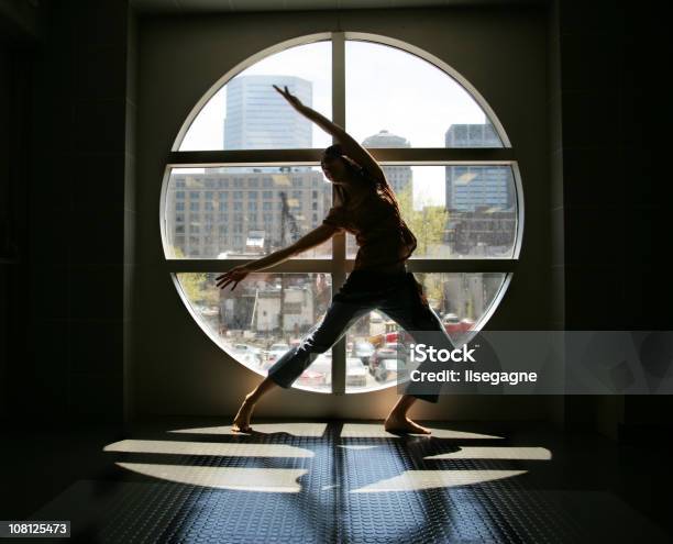 Dancer In Front Of Window Stock Photo - Download Image Now - Circle, People, Window