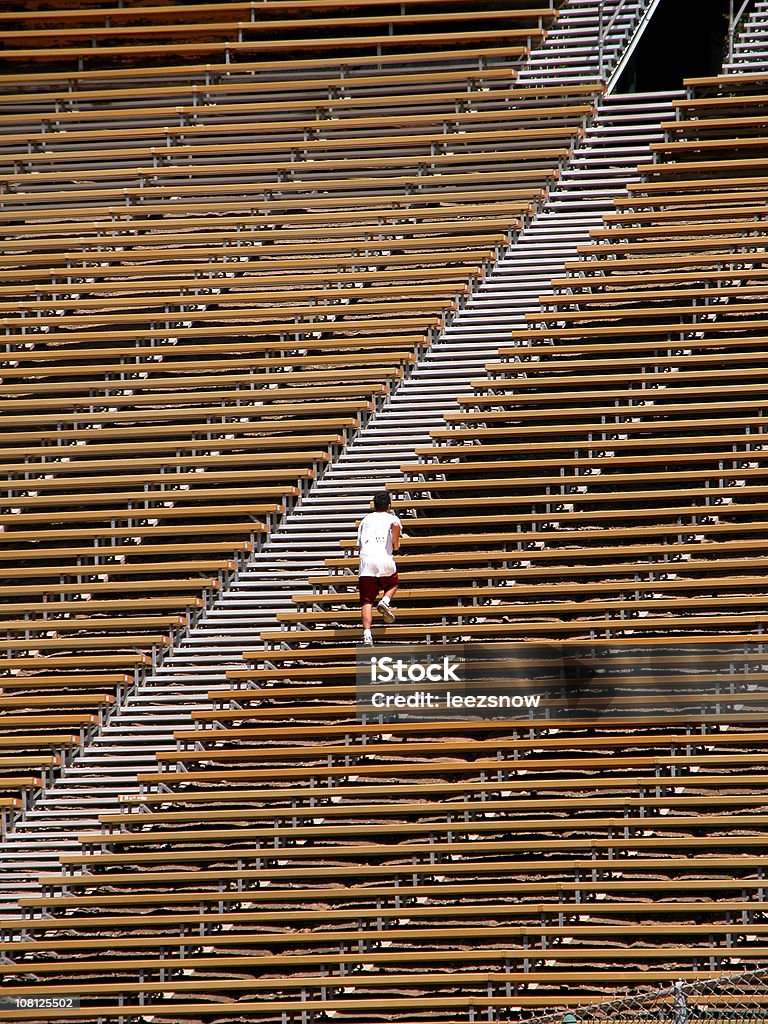 Man Working Out On Bleachers  Steps Stock Photo