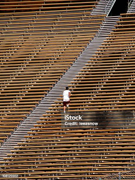 Man Working Out On Bleachers Stock Photo - Download Image Now - Steps, Running, Staircase