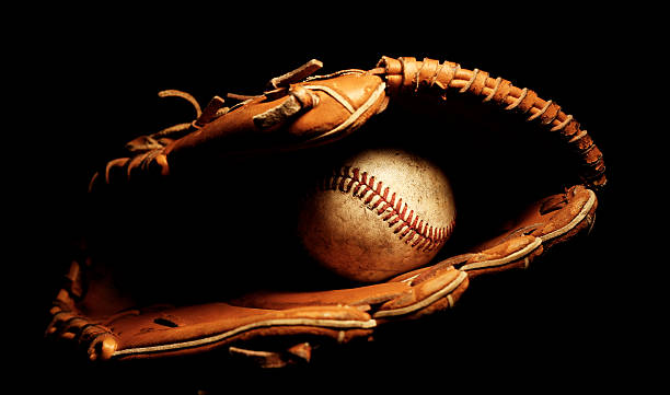 baseball-handschuh mit ball - baseball glove stock-fotos und bilder