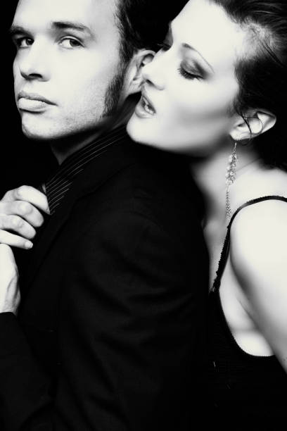 istock Well Dressed Couple Posing, Black and White 108125702