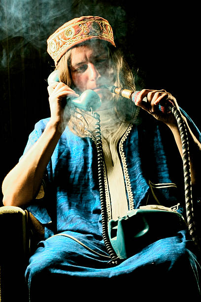 Man Smoking Hookah And Talking On Phone Stock Photo - Download Image Now -  Arabia, Hookah, Mafia - iStock