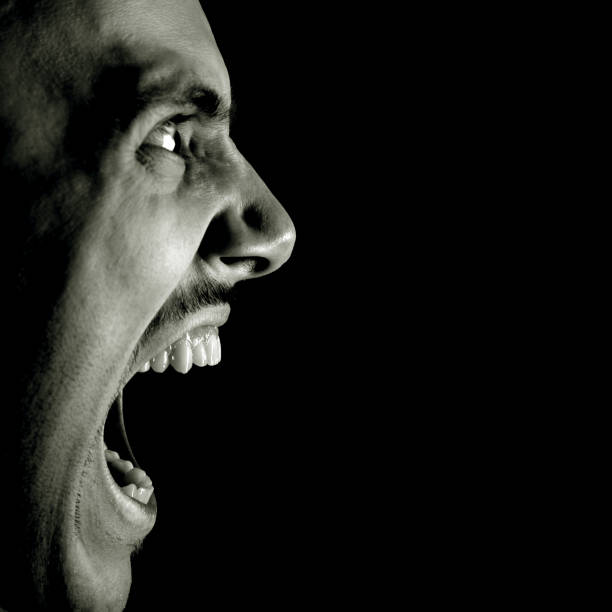 istock Profile View of Man Screaming, Black and White 108126336