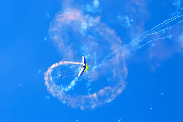 Hang glider soaring in the air