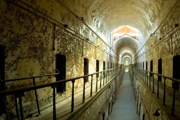 Photo of Old, Abandoned Prison Hallway