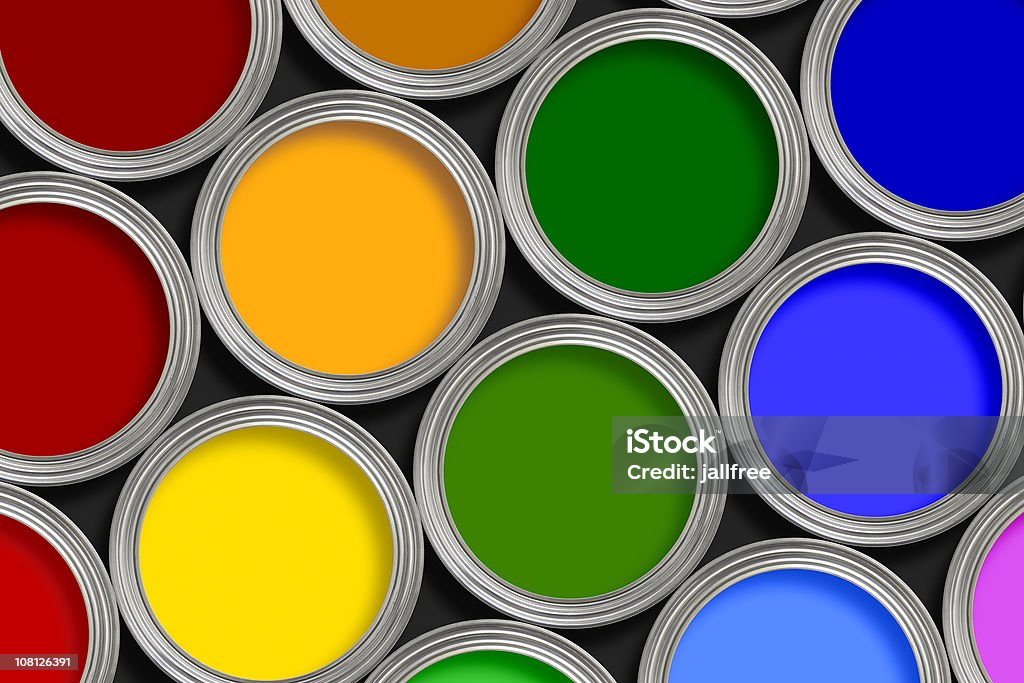 Open multi-colored paint tins from above  Paint Stock Photo