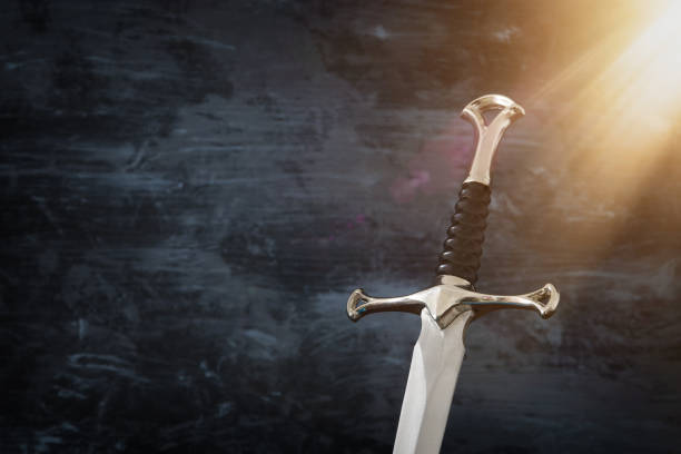 istock low key image of silver sword. fantasy medieval period. 1081264024