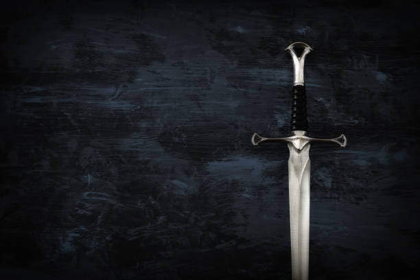istock low key image of silver sword. fantasy medieval period. 1081264034