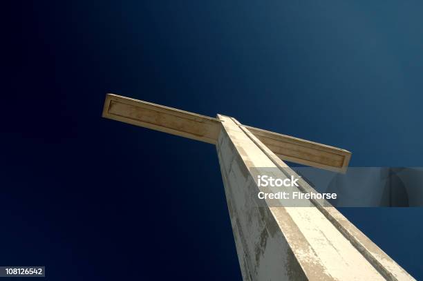 Looking Up At White Cross Against Blue Sky Stock Photo - Download Image Now - Blue, Built Structure, Catholicism