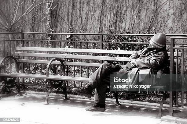 Homeless On A Bench Stock Photo - Download Image Now - Homelessness, Men, Bench