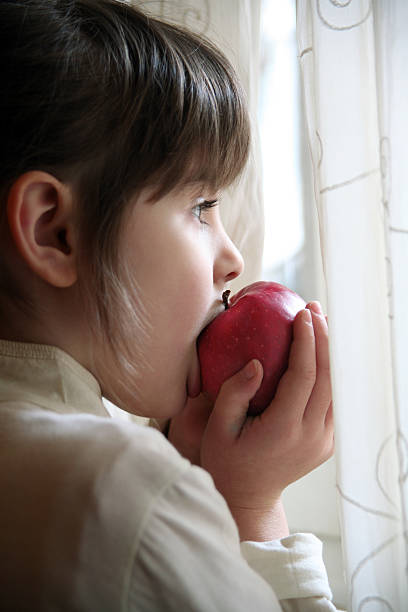 Girl with red apple