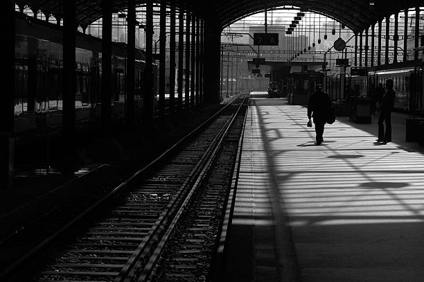 istock People Waiting on Train Station Platform, Black and White 108126976