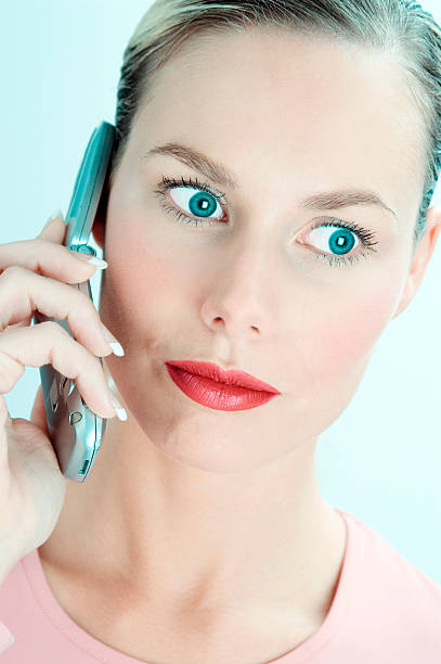 istock Young Woman Talking on Mobile Phone 108127074