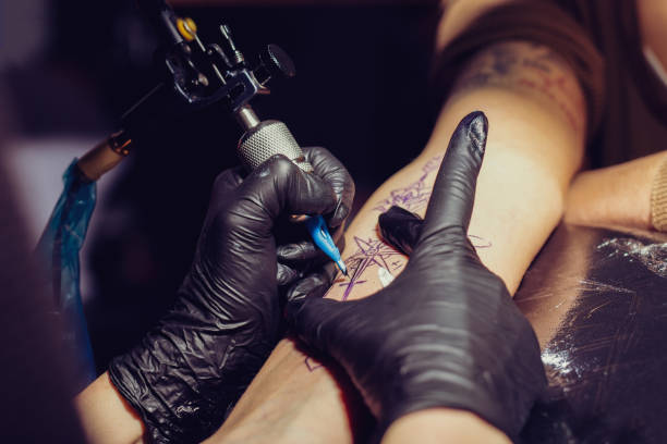 drawing tattoo design - tatuagem imagens e fotografias de stock