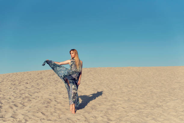 istock Summer walk on the hot sand dunes 1081276964