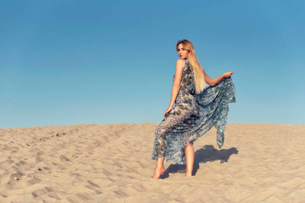 istock Summer walk on the hot sand dunes 1081277158