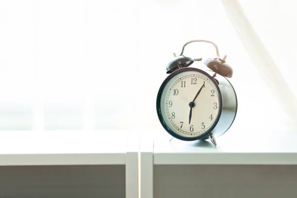 istock Alarm clock in the morning at bedroom. 1081278546